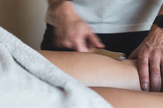 Soft-tissue therapy using a hand-held tool