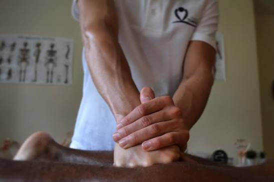 Hands-on soft-tissue treatment at The Solution Clinic